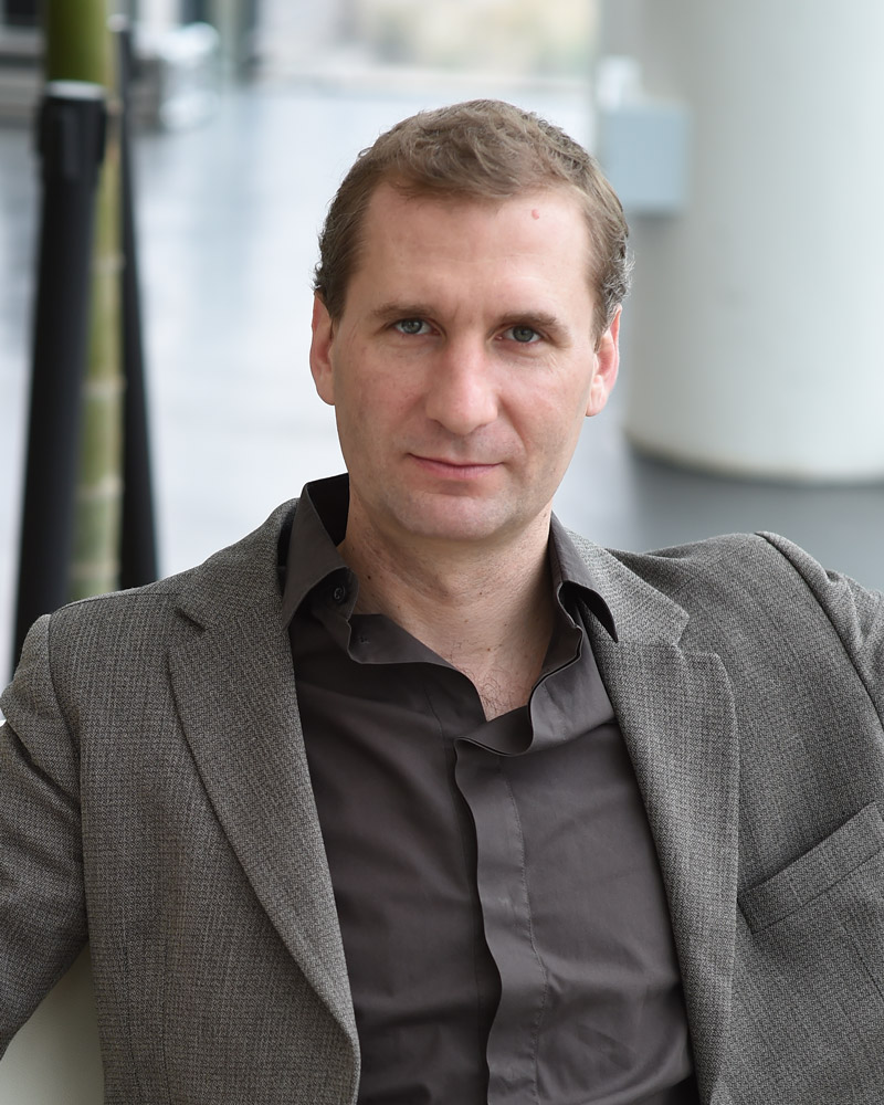 Headshot photo of Interwoven artist Adrien Gardère