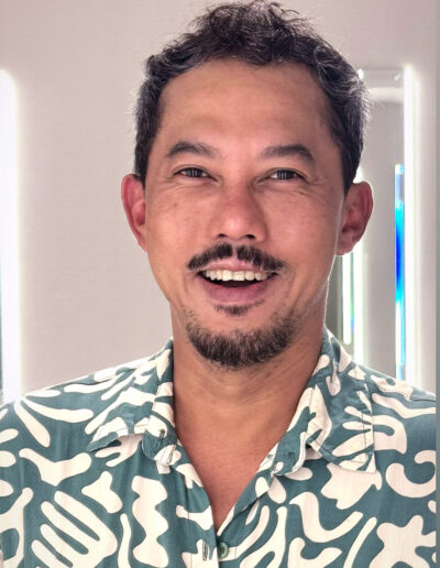 Headshot photo of Interwoven artist Ari Bayuaji