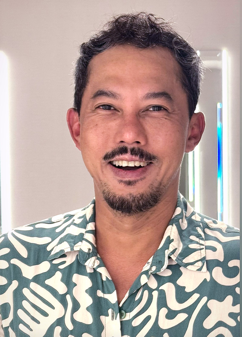 Headshot photo of Interwoven artist Ari Bayuaji